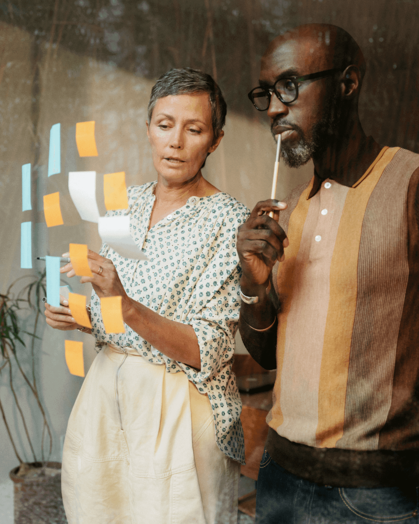 Woman and man working together in a casual office space